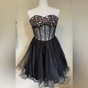 Bejeweled black strapless dress. Perfect for anyone attending the TS ERAS tour.